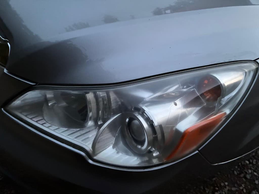 Clear restored headlight lens after professional restoration